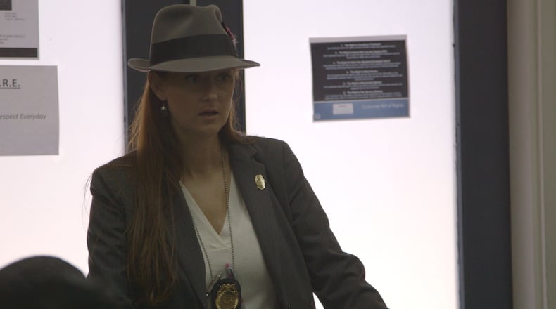 Summer Benton earned her fedora after closing her first homicide case. She is a star of the docu-series, now dubbed "Inside Homicide" for ID. CREDIT: TLC