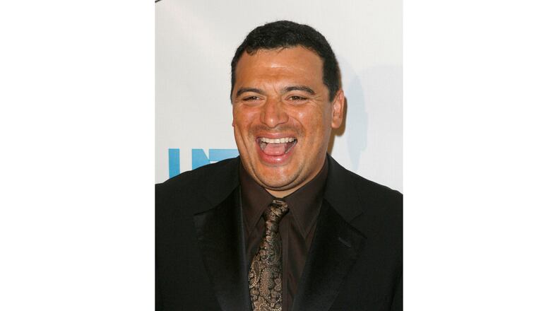 FILE - Actor and comedian Carlos Mencia arrives at the 23rd Annual Imagen Awards, Aug. 21, 2008, in Beverly Hills, Calif. (AP Photo/Gus Ruelas, File)