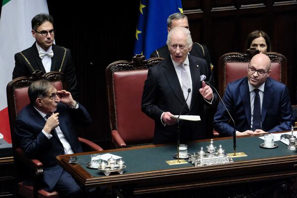 Britain's King Charles III, center, flanked by Ignazio LaRussa, President of the Italian Senate, left, and Lorenzo Fontana, President of the Italian Chamber of Deputies, addresses the Italian Chamber of Deputies in Rome, Wednesday, April 9, 2025. (Mauro Scrobogna/LaPresse via AP)