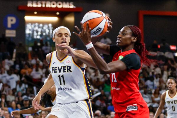 Atlanta Dream guard Maya Caldwell (33) fights for possession against Indiana Fever forward Brianna Turner (11) during the first half of a WNBA basketball first-round playoff game at Gateway Center Arena on Sunday, Sept. 14, 2024, in Atlanta. (Miguel Martinez/ AJC)
