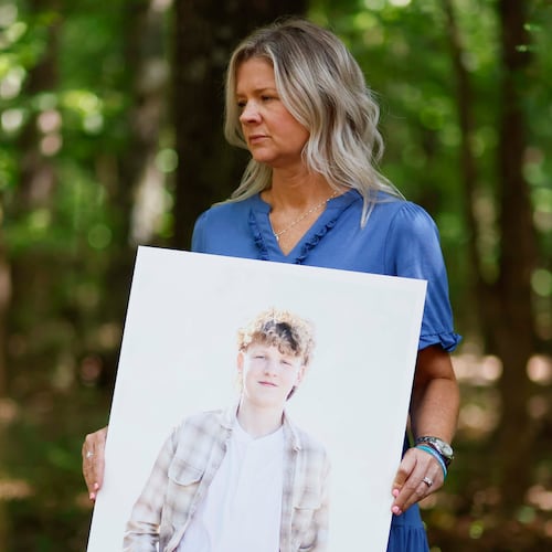 Ashley Worthey holds a portrait of her son, Mason Worthey, at her home in Good Hope, Ga., on Sunday, Aug. 9, 2026. She lost her 17-year-old son on March 6. As Suicide Prevention Month approaches, Ashley shares her story to support other families. (Miguel Martinez/AJC)