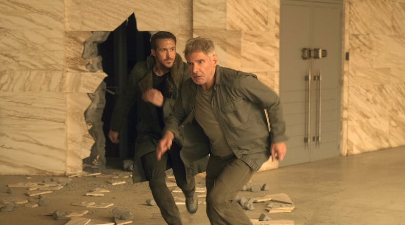 Ryan Gosling, left, and Harrison Ford star “Blade Runner 2049.” Contributed by Stephen Vaughan/Warner Bros. Pictures via AP
