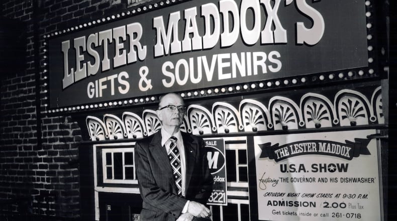 Former governor Lester Maddox in from of his souvenir store in Underground Atlanta. AJC file photo