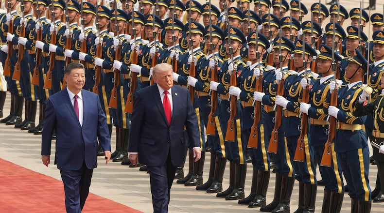 President Donald Trump participates in a welcome ceremony with China's President Xi Jinping at the Great Hall of the People, Thursday, May 14, 2026, in Beijing. (AP Photo/Mark Schiefelbein)