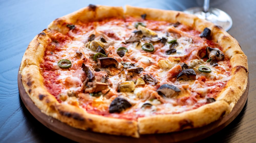 Tre Vele's menu includes a quattro stagioni pizza. Mia Yakel for The Atlanta Journal-Constitution