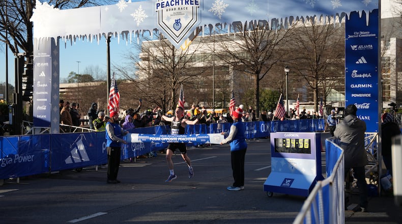 Lars Poettgen, 23, of the Summerhill neighborhood of Atlanta, took first place for men in the inaugural 2025 Polar Opposite Peachtree Road Race. The wintertime race follows the same course as the summertime Peachtree Road Race, only in reverse.