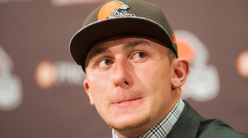 Cleveland Browns draft pick Johnny Manziel answers questions during a press conference at the Browns training facility on May 9, 2014 in Cleveland, Ohio. Manziel was selected in the first round with the 22nd pick. (Photo by Jason Miller/Getty Images)