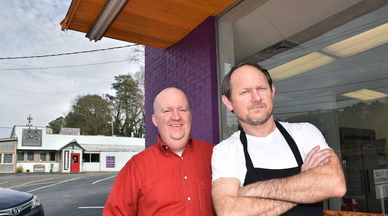 Jason Sheetz (left) and William Sigley outside their virtual restaurant. HYOSUB SHIN / HSHIN@AJC.COM