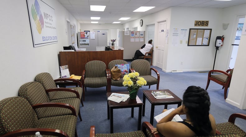 April 17, 2017 - Roswell - Clients wait in the lobby of one of the North Fulton Community Charities offices for help with medicaid applications. The NFCC has seen a drop in legal immigrants seeking food stamps. These immigrants, who are eligible under the law to receive food stamps, are going so far as to drop out of the program when time comes for them to renew their benefits out of fear that signing up will be used to deport them or prevent them from becoming citizens. BOB ANDRES /BANDRES@AJC.COM