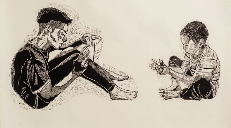 A woodcut “The Binds That Untie Us” by Atlanta artist Chloe Alexander. Photo credit: Sierra King