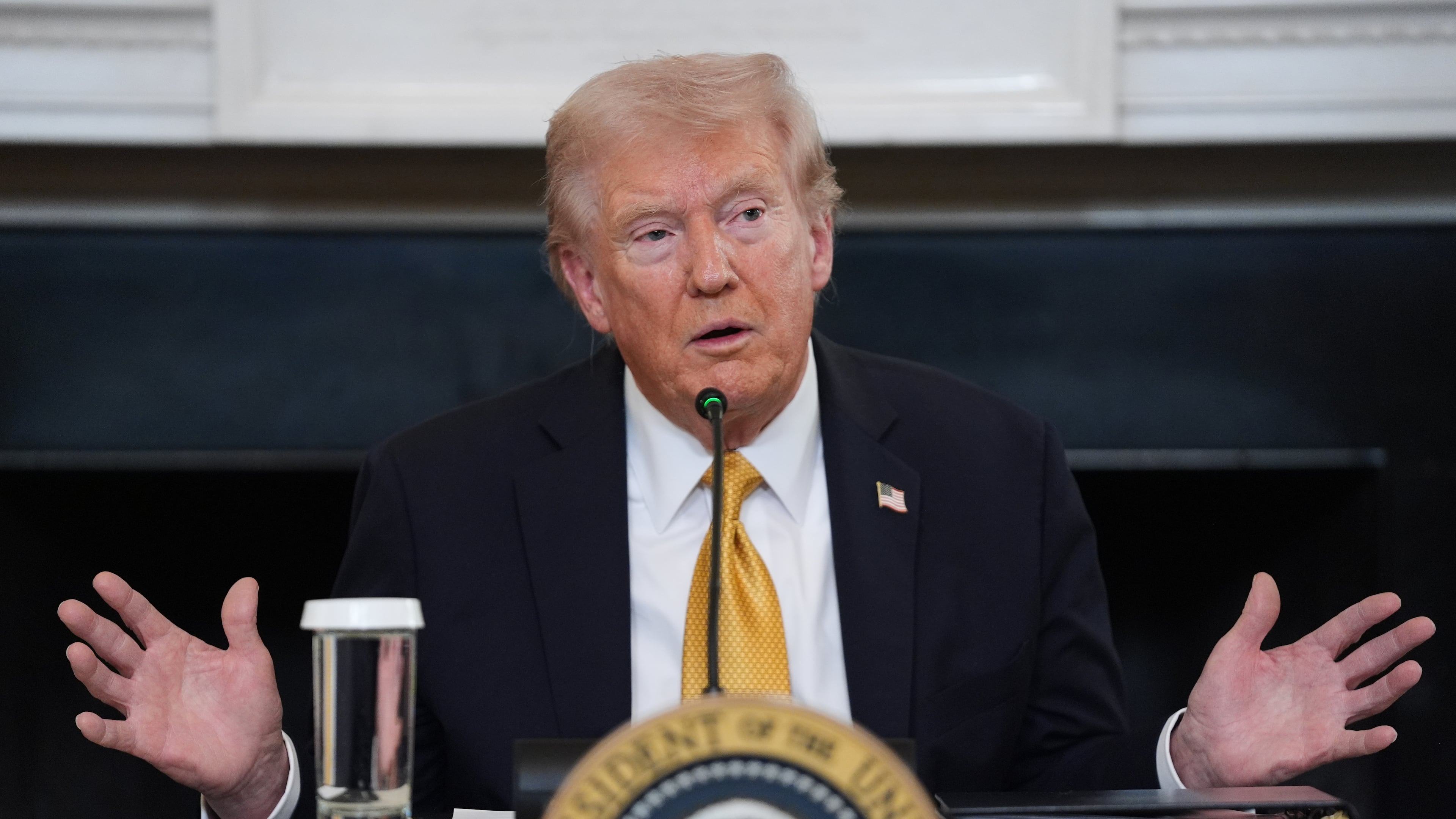 FILE - President Donald Trump answers questions from reporters during a roundtable on criminal cartels in the State Dining Room of the White House, Oct. 23, 2025, in Washington. (AP Photo/Evan Vucci, File)