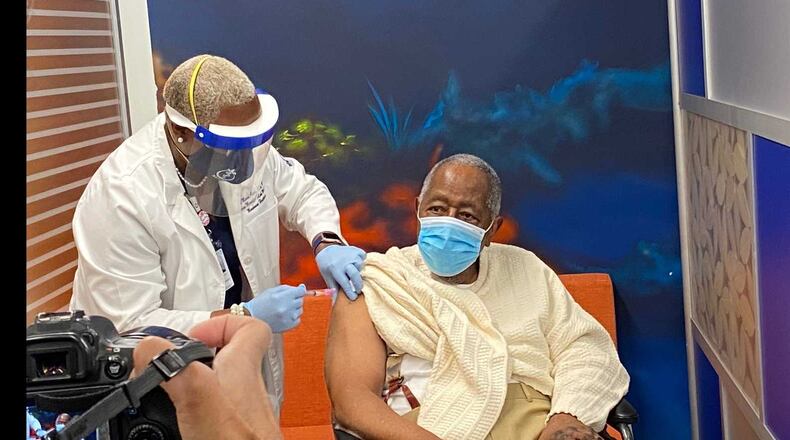 ATLANTA - Baseball legend Hank Aaron gets a dose of the Moderna COVID-19 vaccine shot at Morehouse School of Medicine on Jan. 5, 2021. ERIC STIRGUS/ESTIRGUS@AJC.COM.
