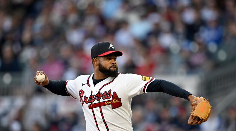 Atlanta Braves pitcher Reynaldo López (40) throws a pitch during the first inning of a baseball game at Truist Park, Saturday, March 28, 2026, in Atlanta. Atlanta Braves Dominic Smith hit a grand slam during the 9th inning to win 6-2 over Kansas City Royals. (Hyosub Shin/AJC)
