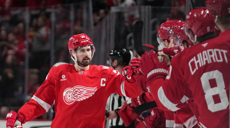 FILE - Detroit Red Wings center Dylan Larkin celebrates his goal against the Columbus Blue Jackets in the first period of an NHL hockey game in Detroit, April 7, 2026. (AP Photo/Paul Sancya, File)