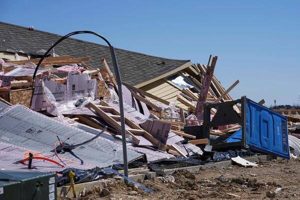 Homes that were under construction sit destroyed after recent severe weather passed through the area in Haslet, Texas, Wednesday, March 5, 2025. (AP Photo/Tony Gutierrez)