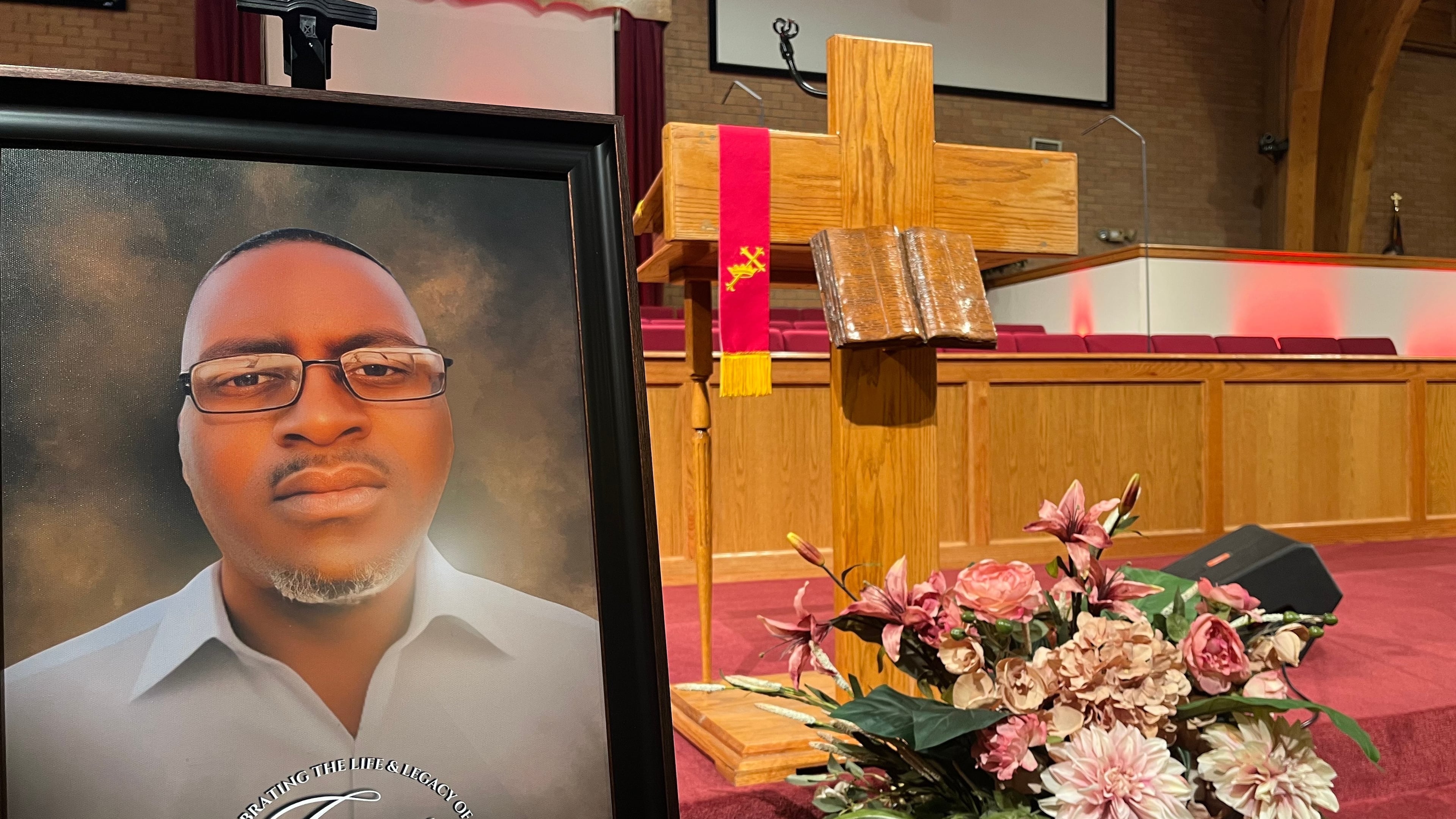 FILE - A photo of Charles Adair, a man killed when a deputy kneeled on his back in a Kansas jail, is displayed Sunday, Sept. 23, 2025, at a news conference held by his family and their attorneys at Friendship Baptist Church in Kansas City, Mo. (AP Photo/Heather Hollingsworth, File)