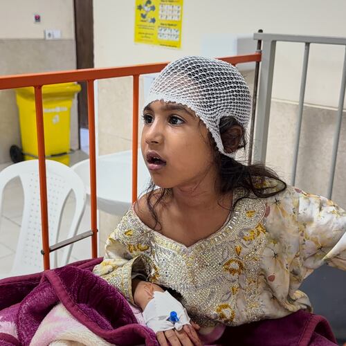 A child wounded, according to Tasnim news agency, in a strike on a home where a wedding was being held in Kuhestak, southern Iran, receives treatment at a hospital in Menab, Iran, early Wednesday, Sept.2, 2026. (Morteza Akhoondi/Tasnim News Agency via AP)