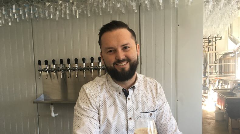 Former Twain’s head brewer Chase Medlin opened Contrast Artisan Ales in late 2018 in a small building in the heart of downtown Chamblee. CONTRIBUTED BY BOB TOWNSEND