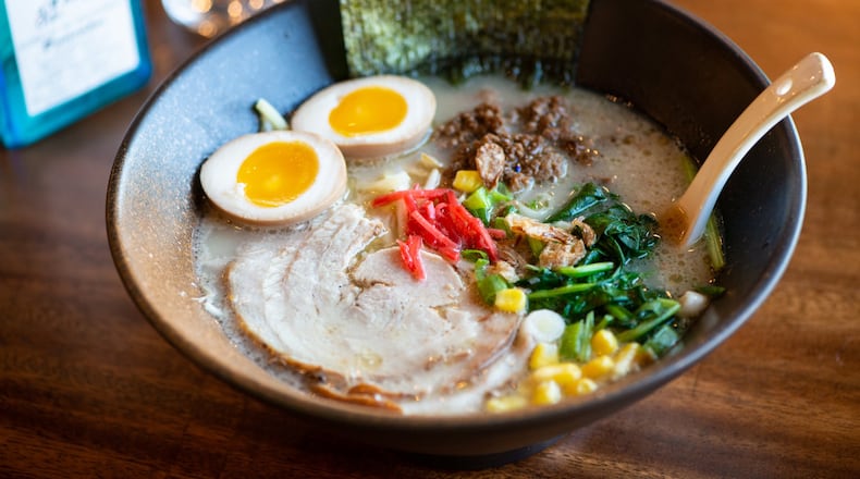 Hotto Tonkotsu Ramen with braised pork belly, minced pork topping, soft-boiled egg, butter garlic corn, veggies, bean sprouts, bamboo shoots, shiitake mushroom, roasted nori and scallions. Photo credit- Mia Yakel.