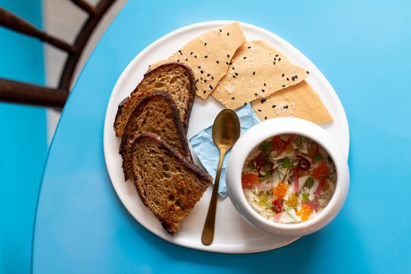 The Blue Crab Beau Monde features chilled crab, roasted celeriac, lemon, fresh herbs, crusty bread and benne crackers. CONTRIBUTED BY MIA YAKEL