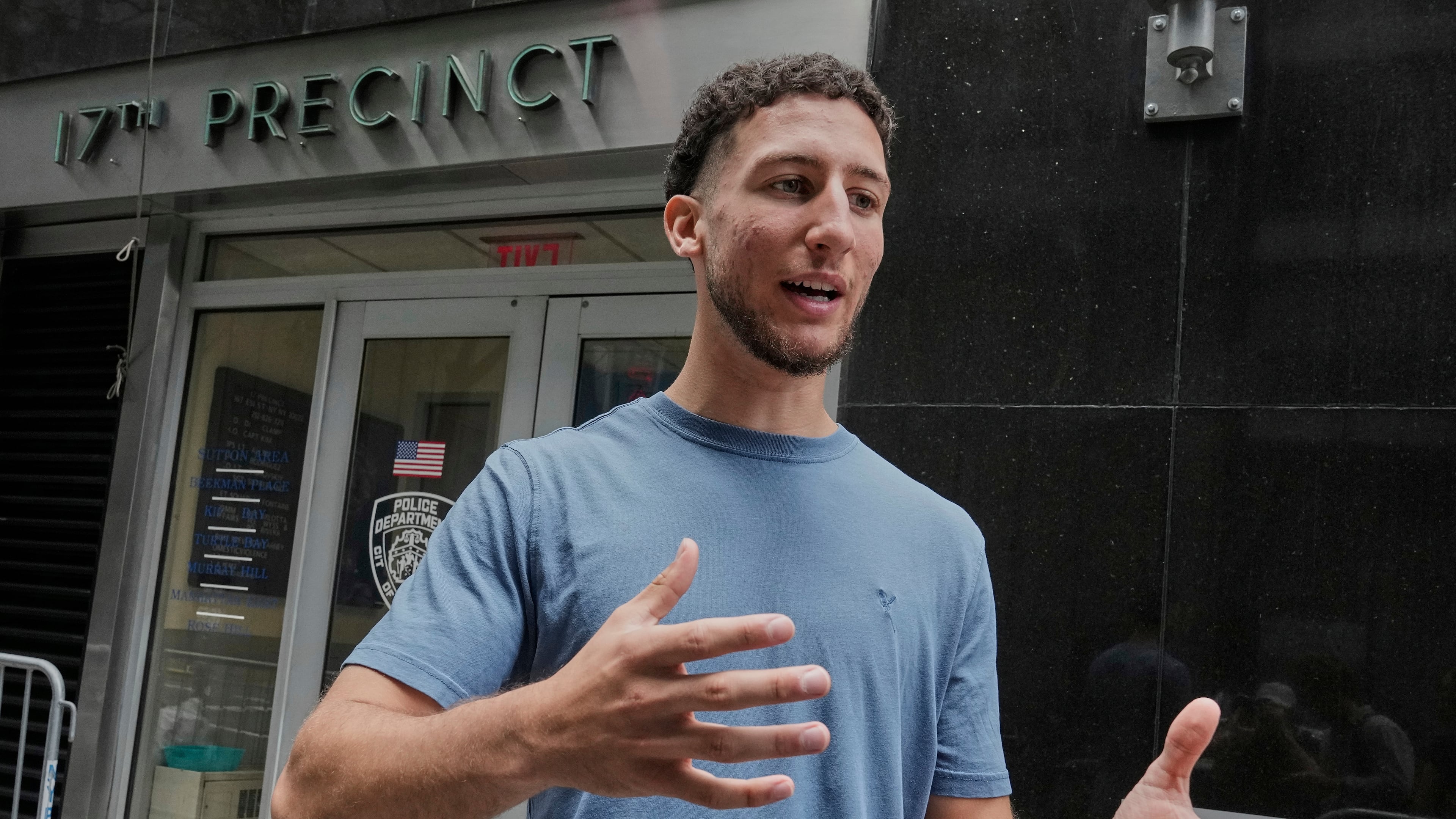 Yasin El Sammak is interviewed outside the New York City Police Department's 17th Precinct, Wednesday, Aug. 27, 2025. (AP Photo/Richard Drew)
