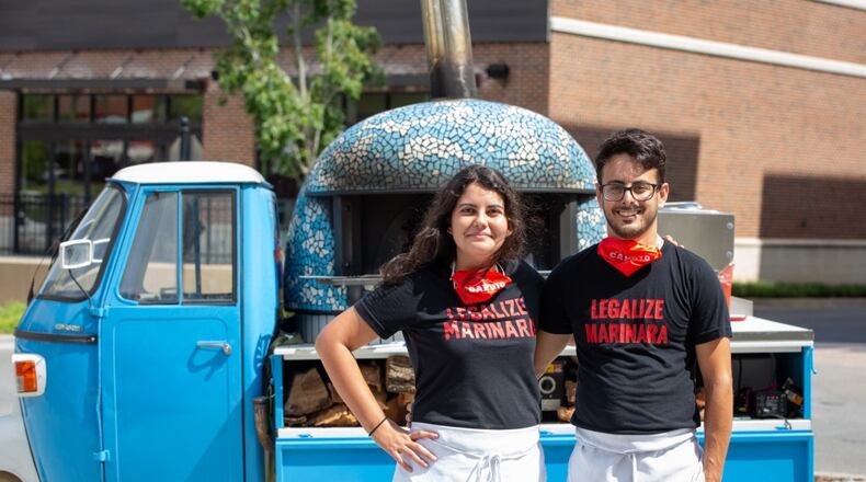 Atlanta Pizza Truck owners Sofia Arango and Alessio Lacco with their vintage ApeCar. (Atlanta Pizza Truck)