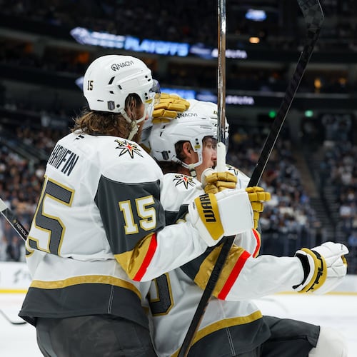 Vegas Golden Knights defenseman Noah Hanifin (15) and right wing Mitch Marner (93) celebrate a goal against the Utah Mammoth during the second period of Game 6 in the first round of an NHL hockey Stanley Cup playoff series, Friday, May 1, 2026, in Salt Lake City. (AP Photo/Melissa Majchrzak)