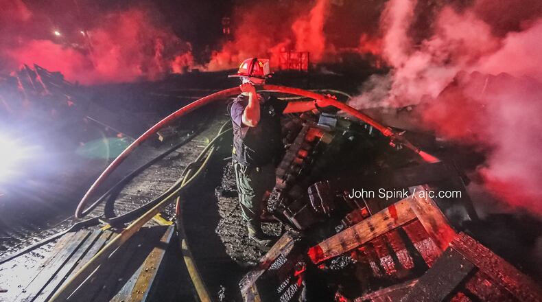 Several homes in southeast Atlanta were evacuated overnight after an explosion caused a major fire at a nearby pallet facility, authorities said.