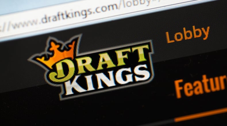 The fantasy sports website DraftKings is shown last year in Chicago, Illinois. DraftKings and its rival FanDuel came under scrutiny after accusations surfaced of employees participating in the contests with insider information. (Photo illustration by Scott Olson/Getty Images)