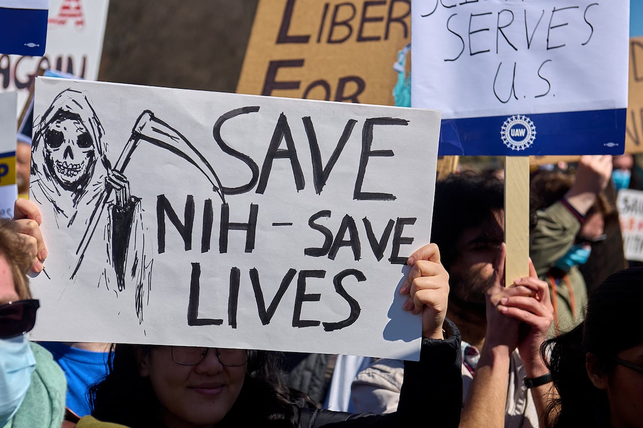 Thousands protest the Trump administration's federal funding cuts during the Stand-Up for Science rally in Washington on March 7, 2025. (Dominic Gwinn/Middle East Images/AFP via Getty Images/TNS)