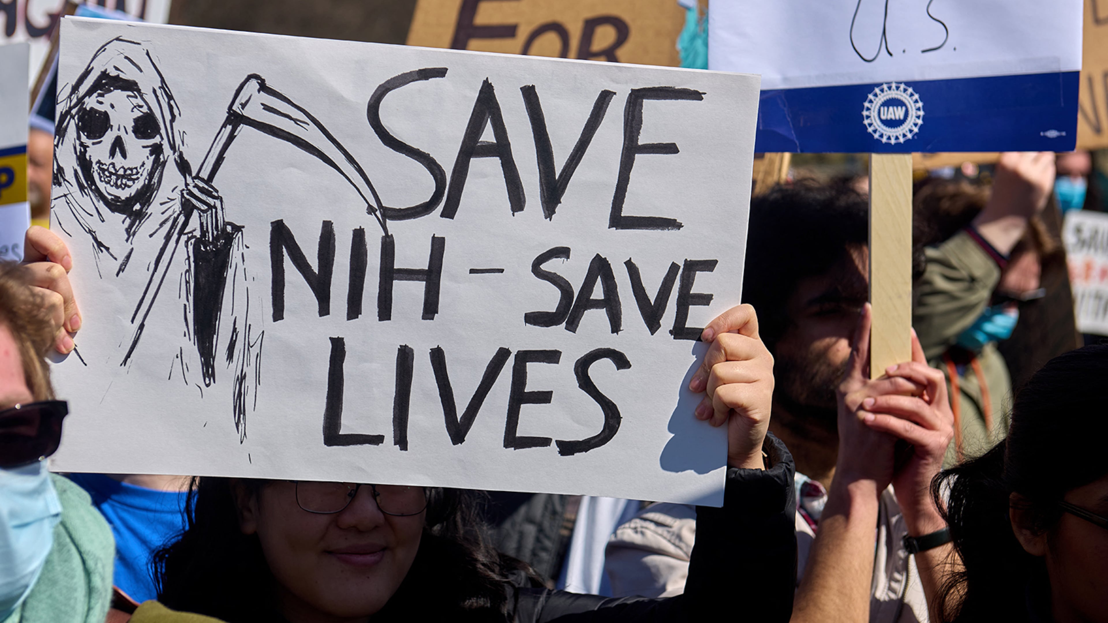 Thousands protest the Trump administration's federal funding cuts during the Stand-Up for Science rally in Washington on March 7, 2025. (Dominic Gwinn/Middle East Images/AFP via Getty Images/TNS)