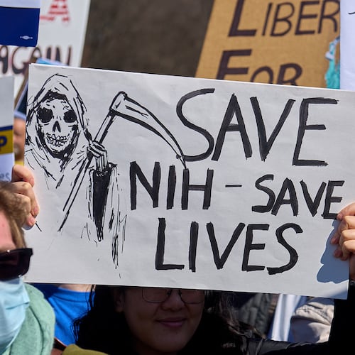 Thousands protest the Trump administration's federal funding cuts during the Stand-Up for Science rally in Washington on March 7, 2025. (Dominic Gwinn/Middle East Images/AFP via Getty Images/TNS)