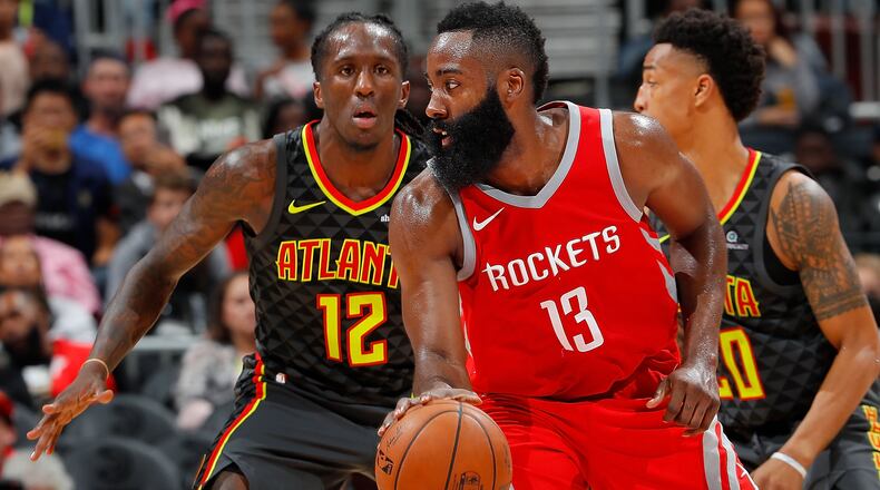 James Harden of the Houston Rockets looks to drive against Taurean Prince #12 of the Atlanta Hawks at Philips Arena on November 3, 2017 in Atlanta, Georgia.  (Photo by Kevin C. Cox/Getty Images)
