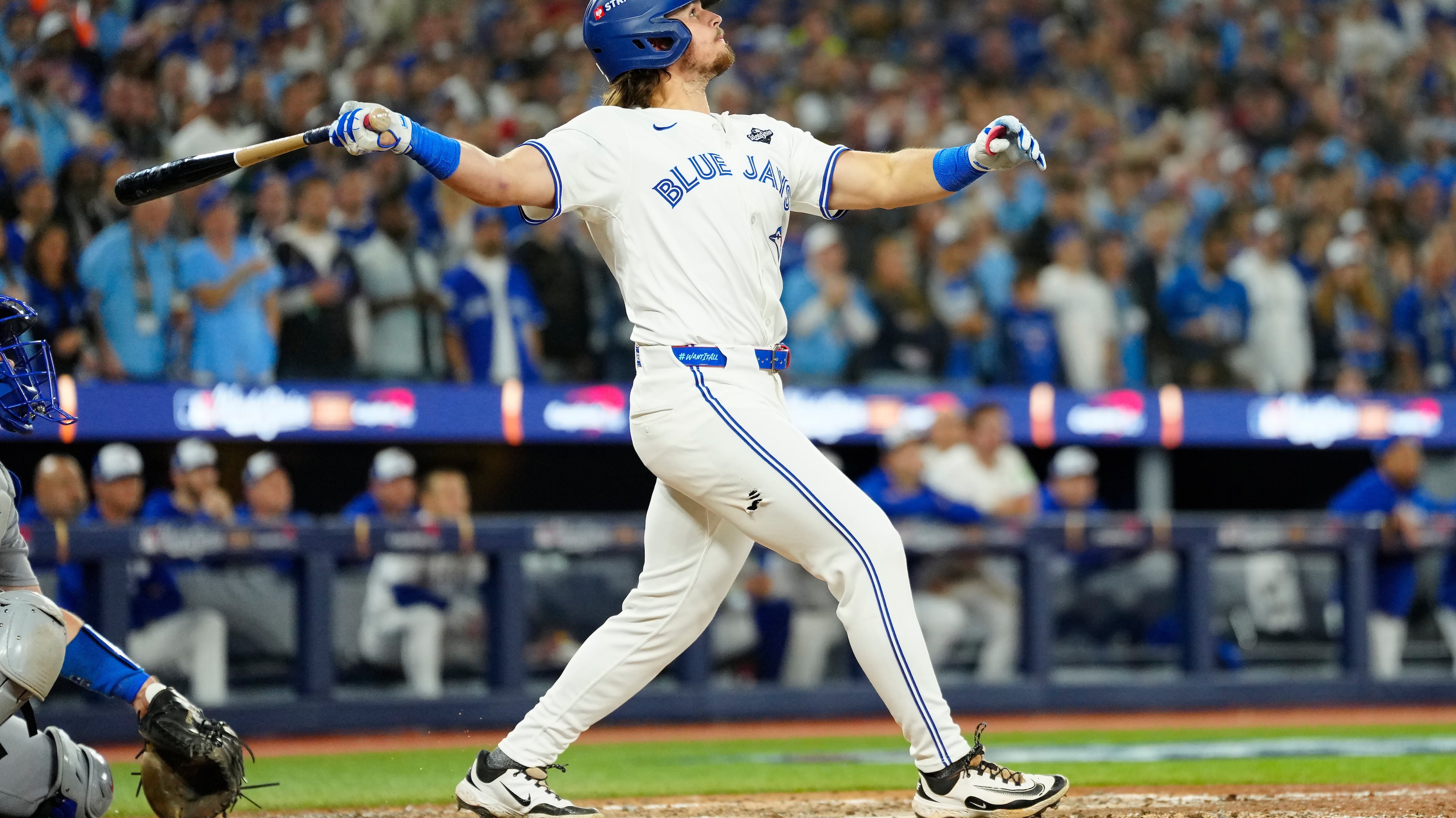 Toronto Blue Jays' Addison Barger watches his grand slam against the Los Angeles Dodgers during the sixth inning of Game 1 of baseball's World Series in Toronto, Friday, Oct. 24, 2025. (Frank Gunn/The Canadian Press via AP)