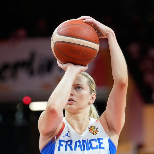 France's Marine Johannes shoots during the Women's Basketball World Cup match between France and Korea in Berlin, Saturday, Sept. 5, 2026. (AP Photo/Ebrahim Noroozi)