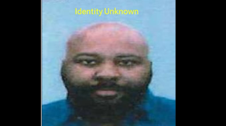 Gwinnett County police say this unidentified man used a dead person's identity to fraudulently buy a BMW.