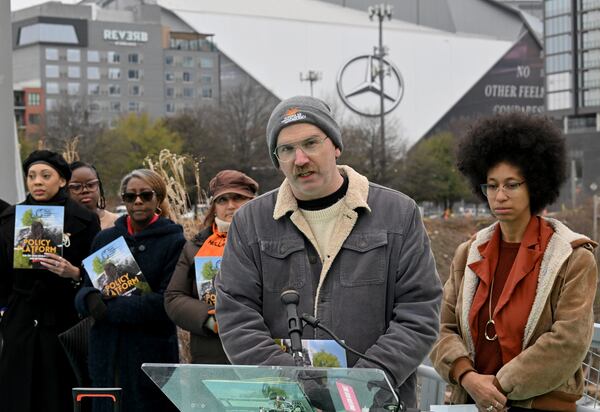 Michael Collins, director of Play Fair ATL, speaks during an event Thursday, Dec. 4, 2025, to launch its policy platform outlining community-driven demands ahead of the FIFA World Cup in Atlanta. (Hyosub Shin/AJC)
