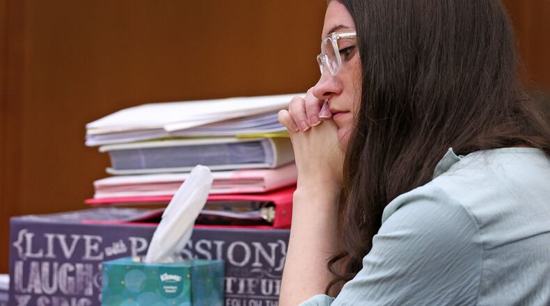Lindsay Clancy listens to her mother Paula Musgrove on the witness stand during her murder trial in Plymouth Superior Court, in Plymouth, Mass., Monday, Aug. 17, 2026. (Greg Derr/The Patriot Ledger via AP, Pool)