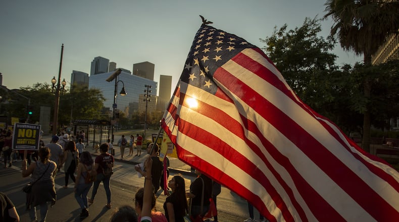 Immigrants and supporters rally and march in Los Angeles, in opposition to President Donald Trump’s order to end DACA on Tuesday. David McNew/Getty Images