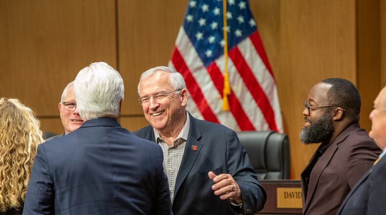 Cobb County School Board member Randy Scamihorn, center, and Leroy "Tre’" Hutchins, right, start the public portion of the meeting with award acknowledgment at the monthly meeting Thursday, June 9, 2022. (Jenni Girtman for The Atlanta Journal-Constitution)