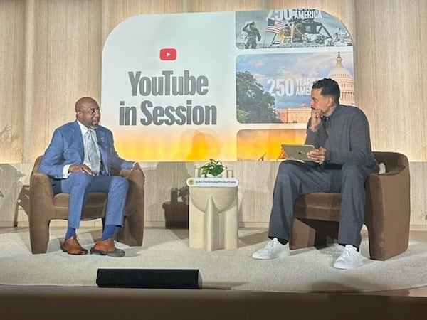 U.S. Sen. Raphael Warnock (left) spoke with former NBA player Matt Barnes at an event hosted by YouTube on Wednesday. (Courtesy photo)