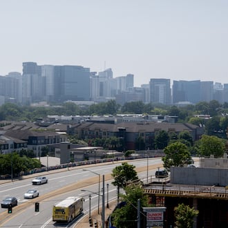Hazy skies linger above Atlanta on Friday, July 31, 2026. (Ben Hendren for the AJC)