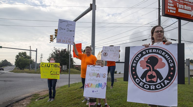 Supporters of the Stop Sterigenics Georgia organization protest near the site of the Sterigenics plant in Smyrna. Stop Sterigenics Georgia is an organization that is concerned about emissions of ethylene oxide coming from the Cobb County plant. A recent air sample taken in DeKalb County, more than 20 miles away from the Sterigenics plant, found a level of ethylene oxide 15 times higher than federal regulators deem acceptable. (Alyssa Pointer/alyssa.pointer@ajc.com)