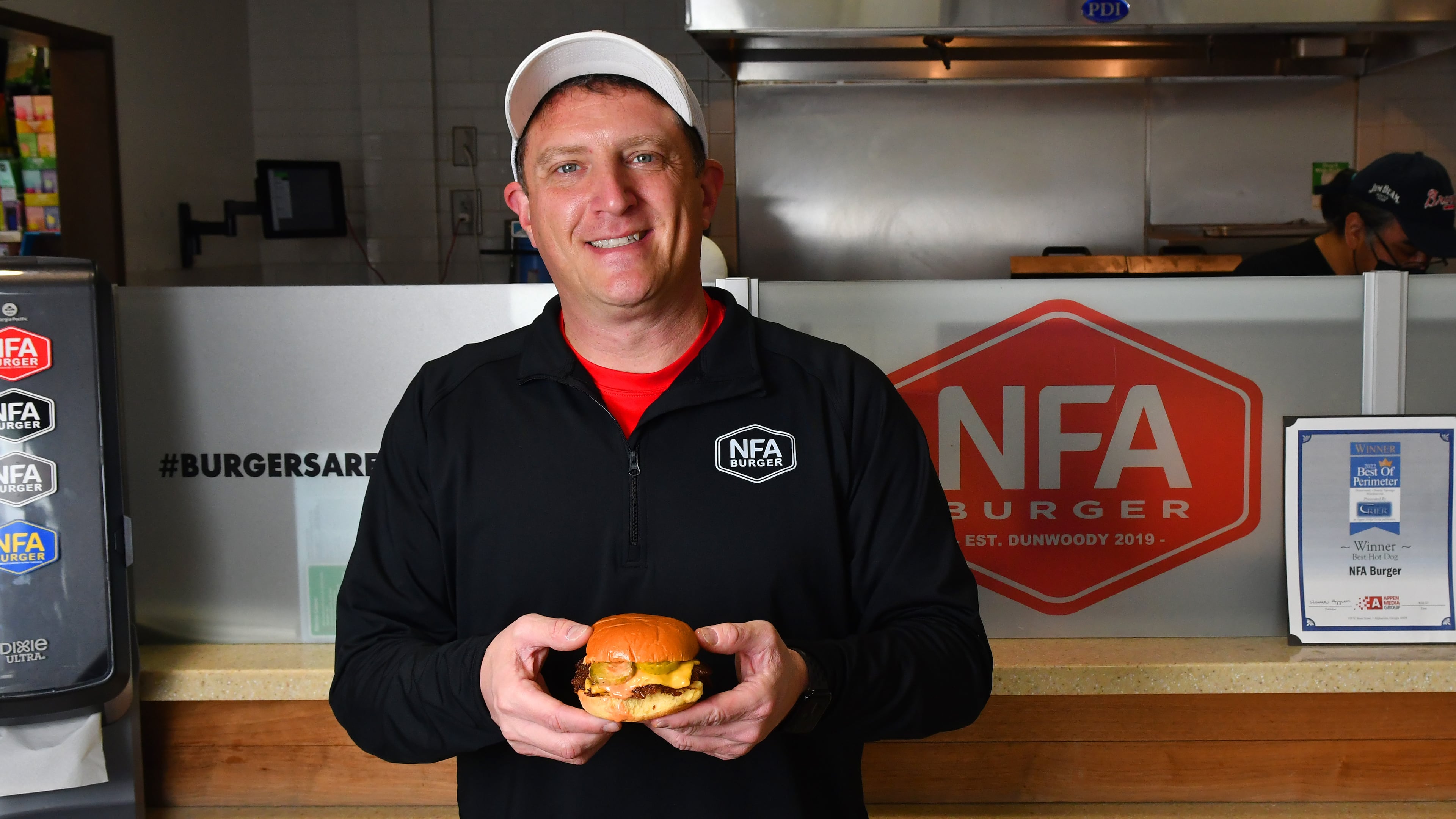 Billy Kramer started NFA Burger in a Chevron gas station/convenience store in Dunwoody. (AJC 2023)