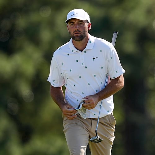 Scottie Scheffler walks to green on the 18th hole during the third round of the Masters golf tournament at the Augusta National Golf Club, Saturday, April 11, 2026, in Augusta, Ga. (AP Photo/David J. Phillip)