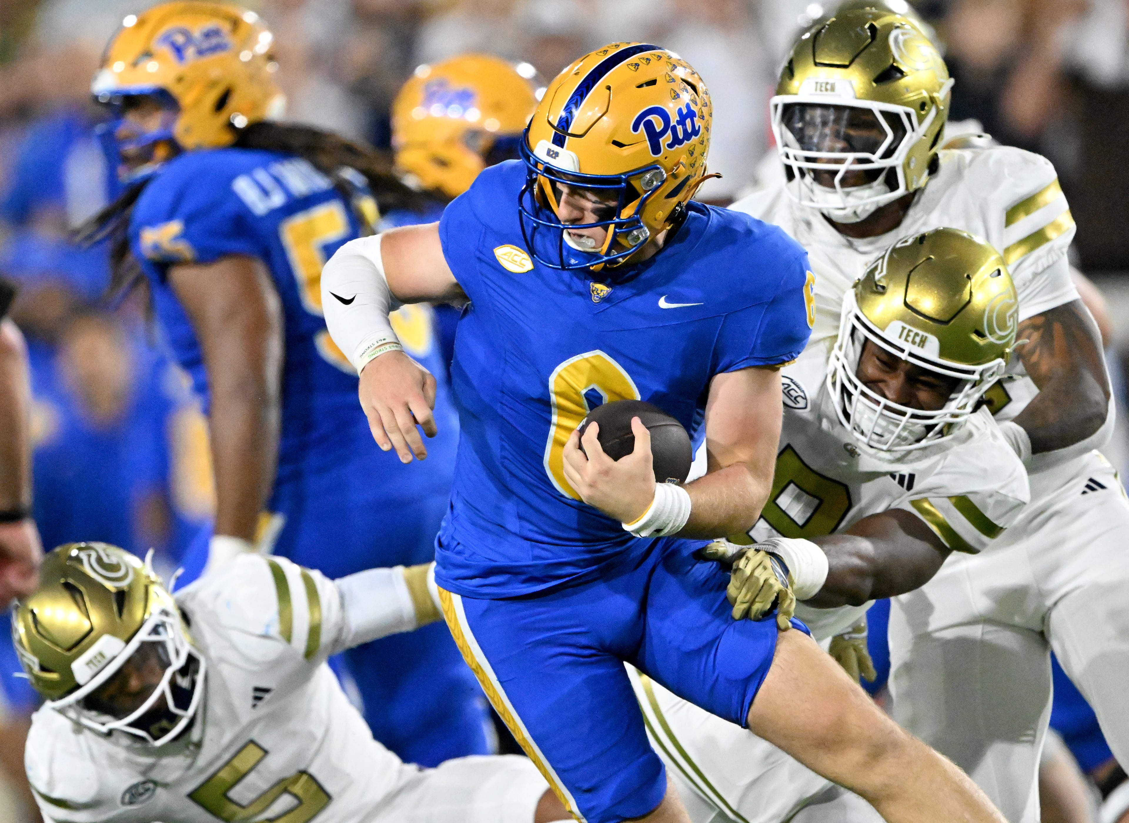 Pittsburgh quarterback Mason Heintschel (6) is sacked by Georgia Tech defensive lineman Jordan Boyd (8) during the first half in an NCAA college football game at Bobby Dodd Stadium, Saturday, November 22, 2025 in Atlanta. (Hyosub Shin / AJC)