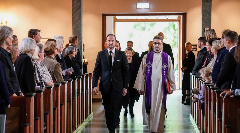 Norway's King Haakon arrives for the mourning service for King Harald in Asker church, Asker, Norway, Sunday Aug. 30, 2026. (Cornelius Poppe/NTB via AP)