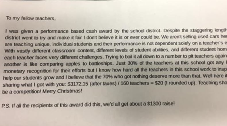 A Gwinnet teacher awarded a $3,725 performance bonus this week from the school district turned around and shared the money with colleagues.