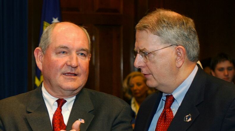 Future Gov. Sonny Perdue and then-Gov. Roy Barnes in 2002 (AP File)