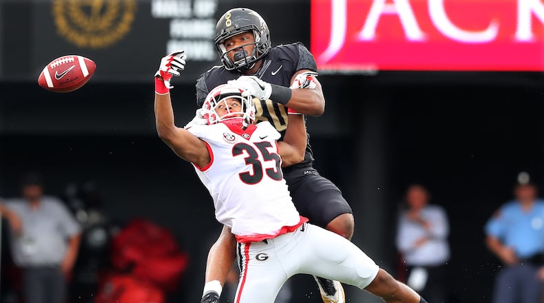 October 7, 2017 Nashville: Georgia cornerback Aaron Davis breaks up a pass to Vanderbilt tight end Jared Pinkney during the first half in a NCAA college football game on Saturday, October 7, 2017, in Nashville. Curtis Compton/ccompton@ajc.com